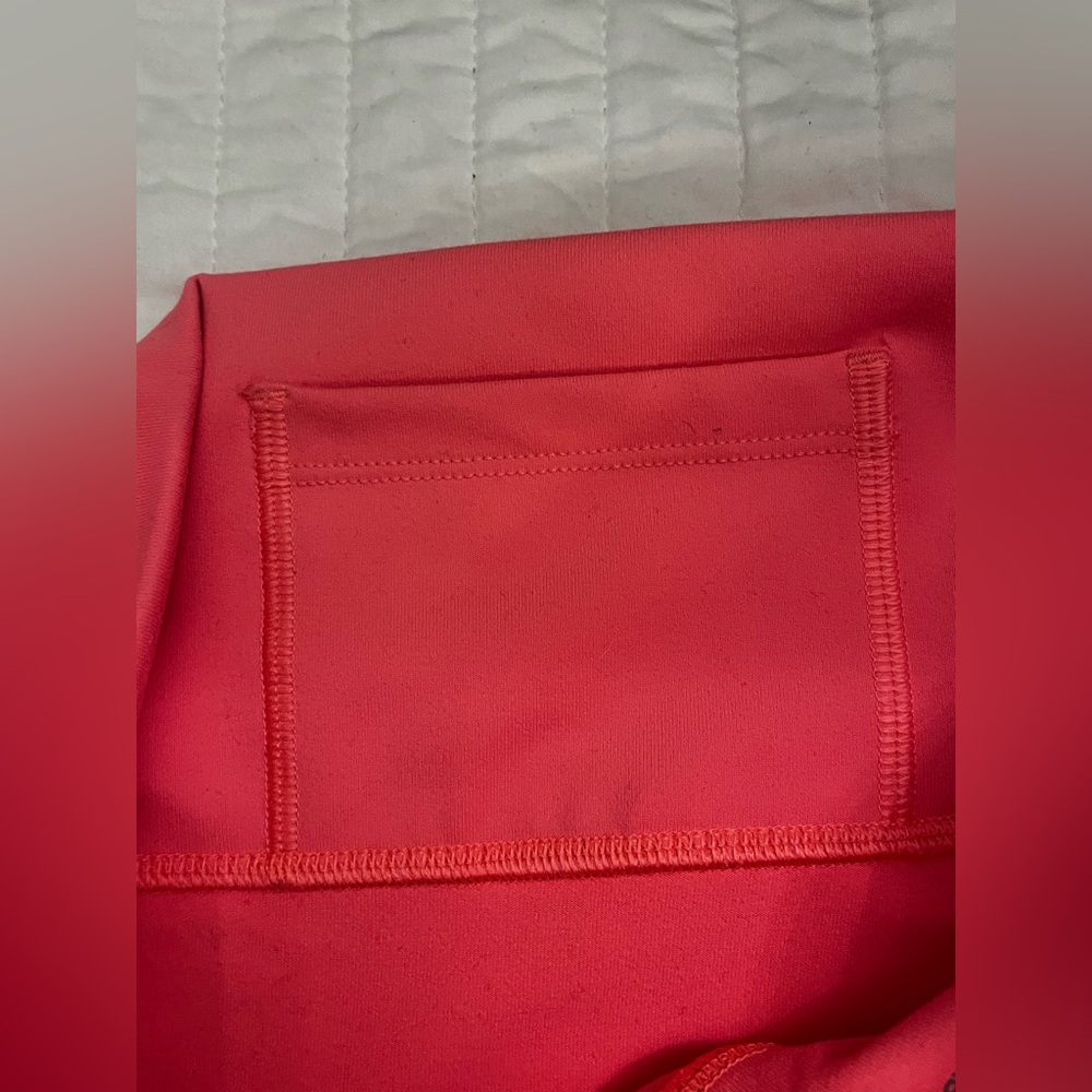 Fabletics Define PowerHold® High-Waisted 7/8 Legging in pop coral - Picture 6 of 6